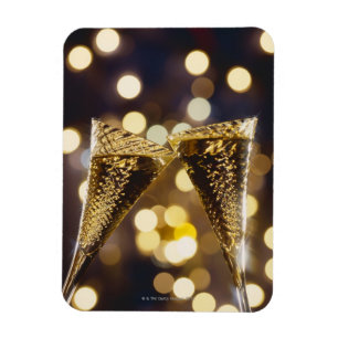 Toasted champagne flute, close-up magnet