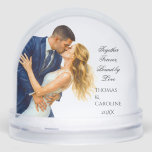 Together Forever Bound by Love Timeless Gift Snowglobe<br><div class="desc">Celebrate everlasting love with this beautifully artistic snow globe featuring two intertwined golden wedding bands resting on a watercolor plate with soft pastel tones. A timeless keepsake for weddings, anniversaries, or engagements, this elegant dome design adds a romantic touch to any décor. Customise it with names, a date, or a...</div>