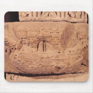 Tombstone depicting a fishing boat mouse mat
