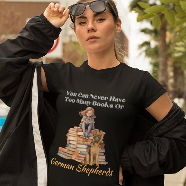 Too Many Books German Shepherd T-Shirt (a girl sitting on a stack of books and reading another book in her lap with a German Shepherd )
