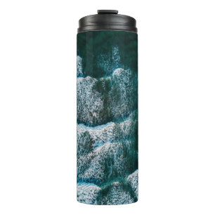 Top view photo of body of water thermal tumbler