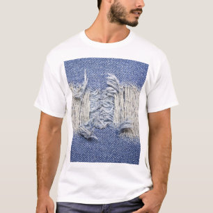 Torn blue denim: jeans texture. T-Shirt