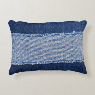 Torn denim: blue jeans fabric. decorative cushion