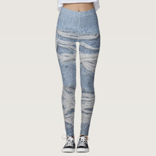Torn denim: blue jeans texture. leggings