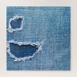 Torn denim fabric texture, blue hues. jigsaw puzzle