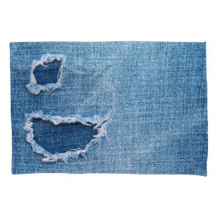 Torn denim fabric texture, blue hues. pillowcase