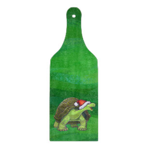 Tortoise in Santa Hat On Green Cutting Board