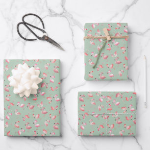 Tossed Christmas Flamingos on Light Green Wrapping Paper Sheet