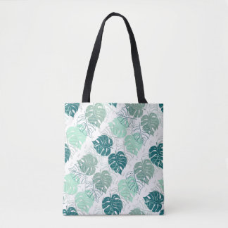 Tote with diagonal tropic leaf pattern bag