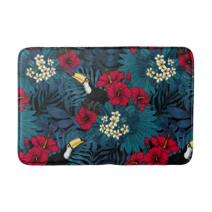 Toucans and tropical flora, green and red bath mat