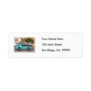 Tough Blue Tow Truck in the Street