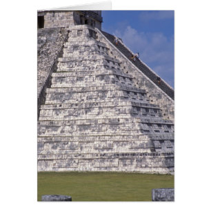 Tourists climbing stairs of El Castillo, stone