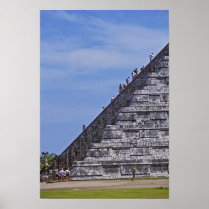 Tourists climbing stairs on ruins of El Poster