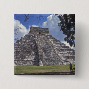 Tourists walk past an unrestored side of El 2 15 Cm Square Badge