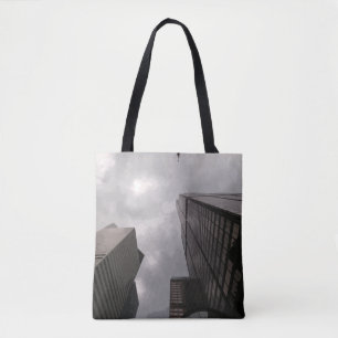 Tower in the city. tote bag