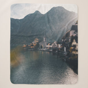 TOWN BESIDE BODY OF WATER AND MOUNTAINS SHERPA BLANKET