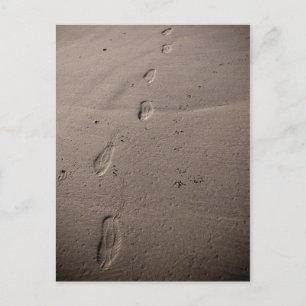 Traces in the sand - beach footprints postcard