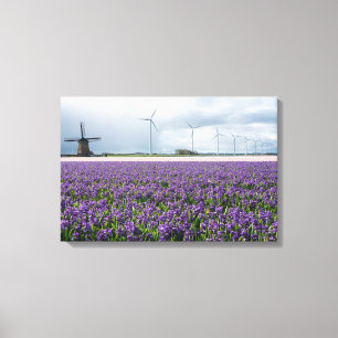 Traditional and modern windmill in Holland canvas Print