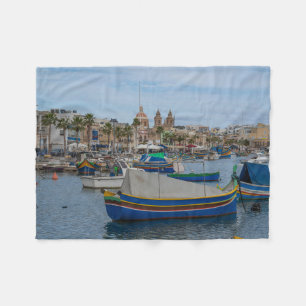 Traditional colorful fishing boats in Malta Fleece Blanket