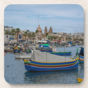 Traditional colourful fishing boats in Malta Coaster