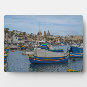 Traditional colourful fishing boats in Malta Plaque