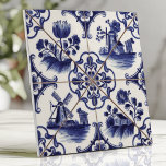 Traditional Delftware Blue Floral and Windmill Tile<br><div class="desc">Capture the charm of traditional Dutch craftsmanship with this Delftware-style tile featuring intricate cobalt blue floral designs and scenic windmills on crisp white ceramic. The hand-painted details and delicate brushwork evoke a vintage folk art aesthetic, making this tile perfect for backsplashes, accent walls, or adding timeless elegance to your home...</div>