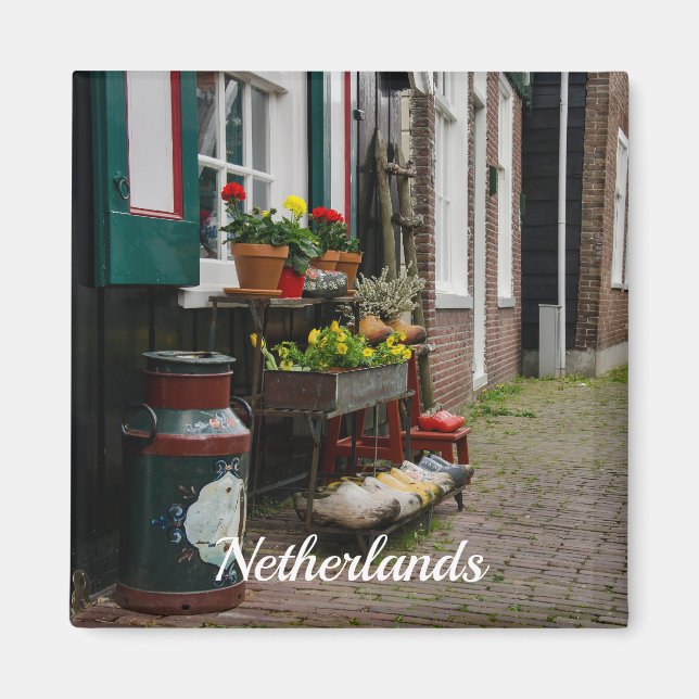 Traditional dutch wooden shoes on street magnet (Front)