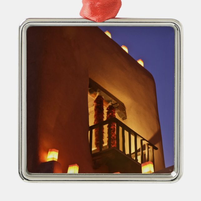 Traditional farolitos light up adobe structures metal tree decoration (Front)