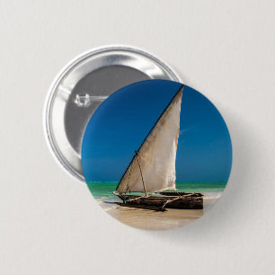 Traditional fishing boat on the beach 6 cm round badge