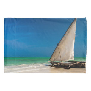 Traditional fishing boat on the beach pillowcase