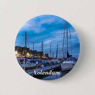 Traditional fishing town night scene 6 cm round badge