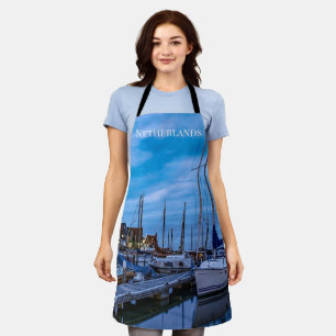 Traditional fishing town night scene. apron