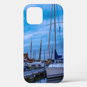 Traditional fishing town night scene iPhone 12 case