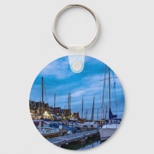 Traditional fishing town night scene key ring