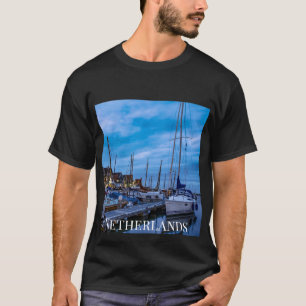 Traditional fishing town night scene. T-Shirt