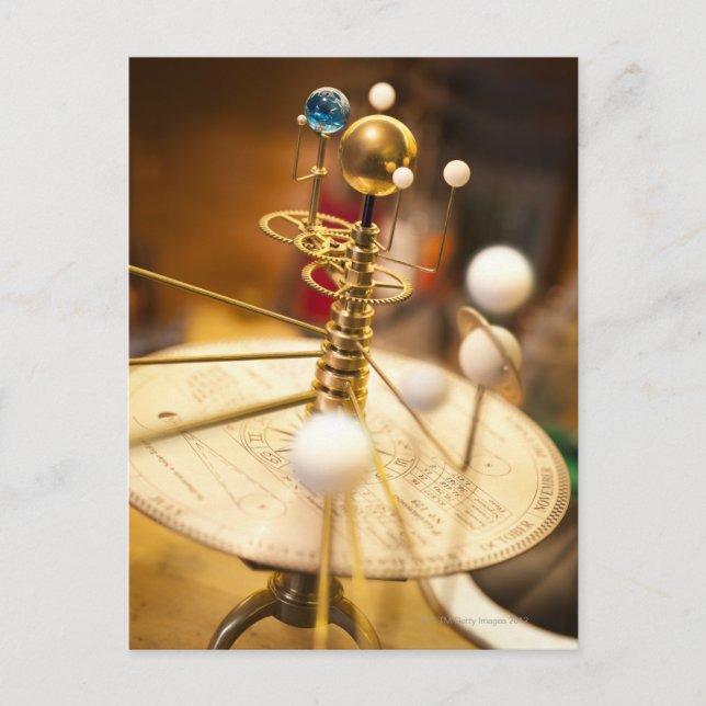 Traditional handcrafted brass orrery with the postcard (Front)