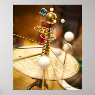 Traditional handcrafted brass orrery with the poster