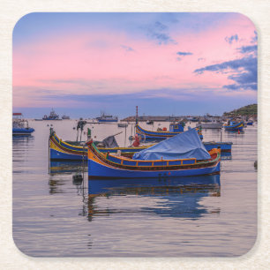 Traditional Maltese boats in Marsaxlokk Square Paper Coaster