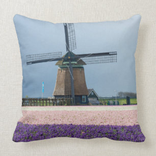 Traditional windmill with pink and purple flowers cushion