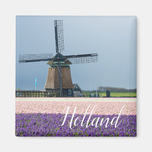 Traditional windmill with pink and purple flowers magnet