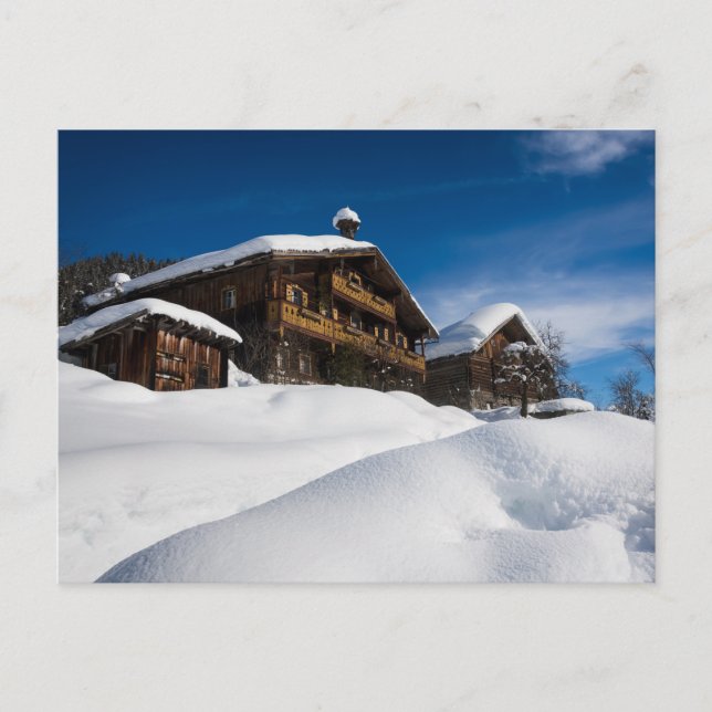 Traditional wooden cabins in de snow postcard (Front)