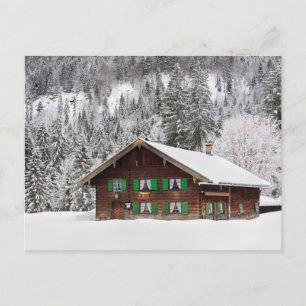 Traditional wooden house in Bavaria postcard