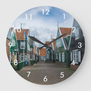 Traditional wooden houses in Marken village Large Clock