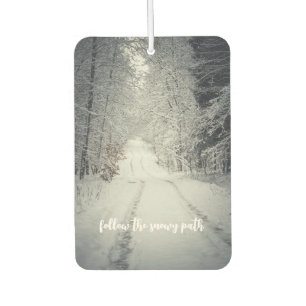Trail through a snow-covered winter forest car air freshener