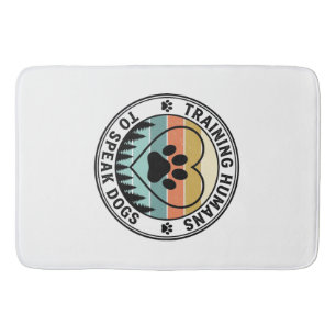 Training Humans to Speak Dogs Vintage Paw Badge_1 Bath Mat