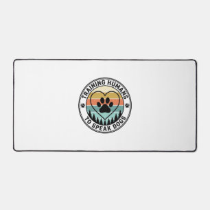 Training Humans to Speak Dogs Vintage Paw Badge_1 Desk Mat