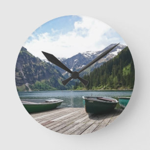 Tranquil Alpine Lake and Boats Photograph Round Clock