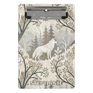 Tranquil Winter Forest Scene with White Wolves Mini Clipboard