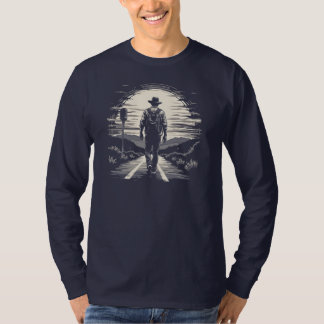 traveller walking on road in front of a sunset T-Shirt
