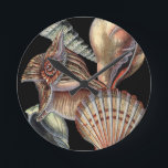 Treasures of the Sea Round Clock<br><div class="desc">This art print displays the finest things in nature within the ocean. Find all the different types of sea life in this image including a Conch Seashell,  Sand Dollars,  and Reefs buried deep in the sea. This art collection is a must have in your next Zazzle products.</div>